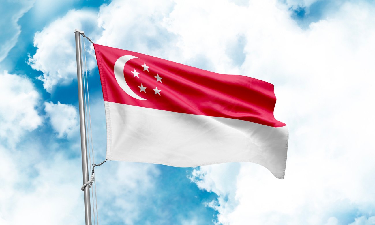 Singapore flag waving on sky background. 3D Rendering